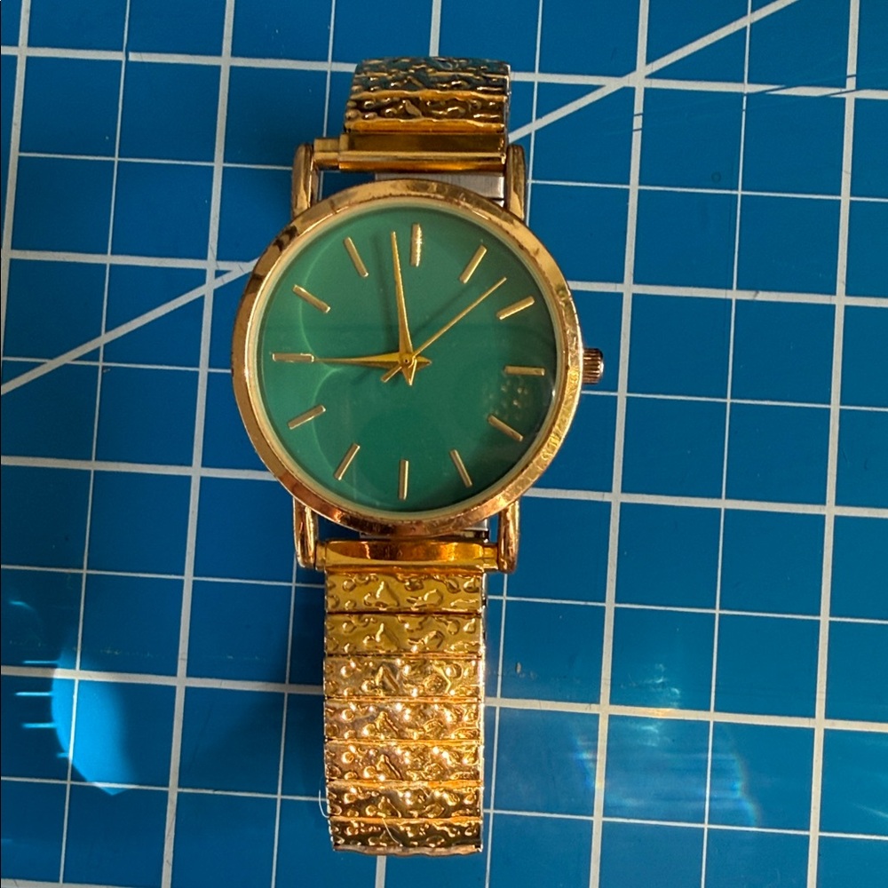 Gold and Green Watch